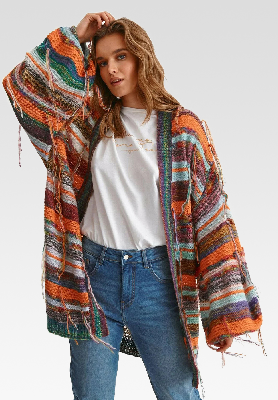 A long-haired lady in colorfull jumper